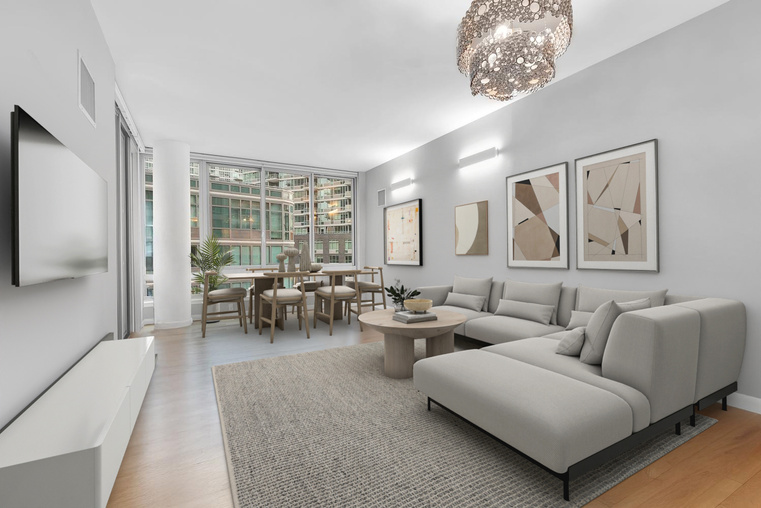 46-30 Center Boulevard, Unit 602 Queens, NY 11109 - Photo 3 of 18 a living room with furniture and a large window