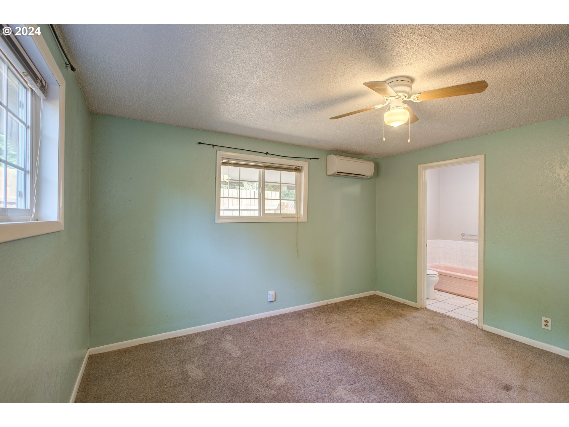 991 Mathis Hill Road Yoncalla, OR 97499 - Photo 15 of 42 a view of an empty room with a window