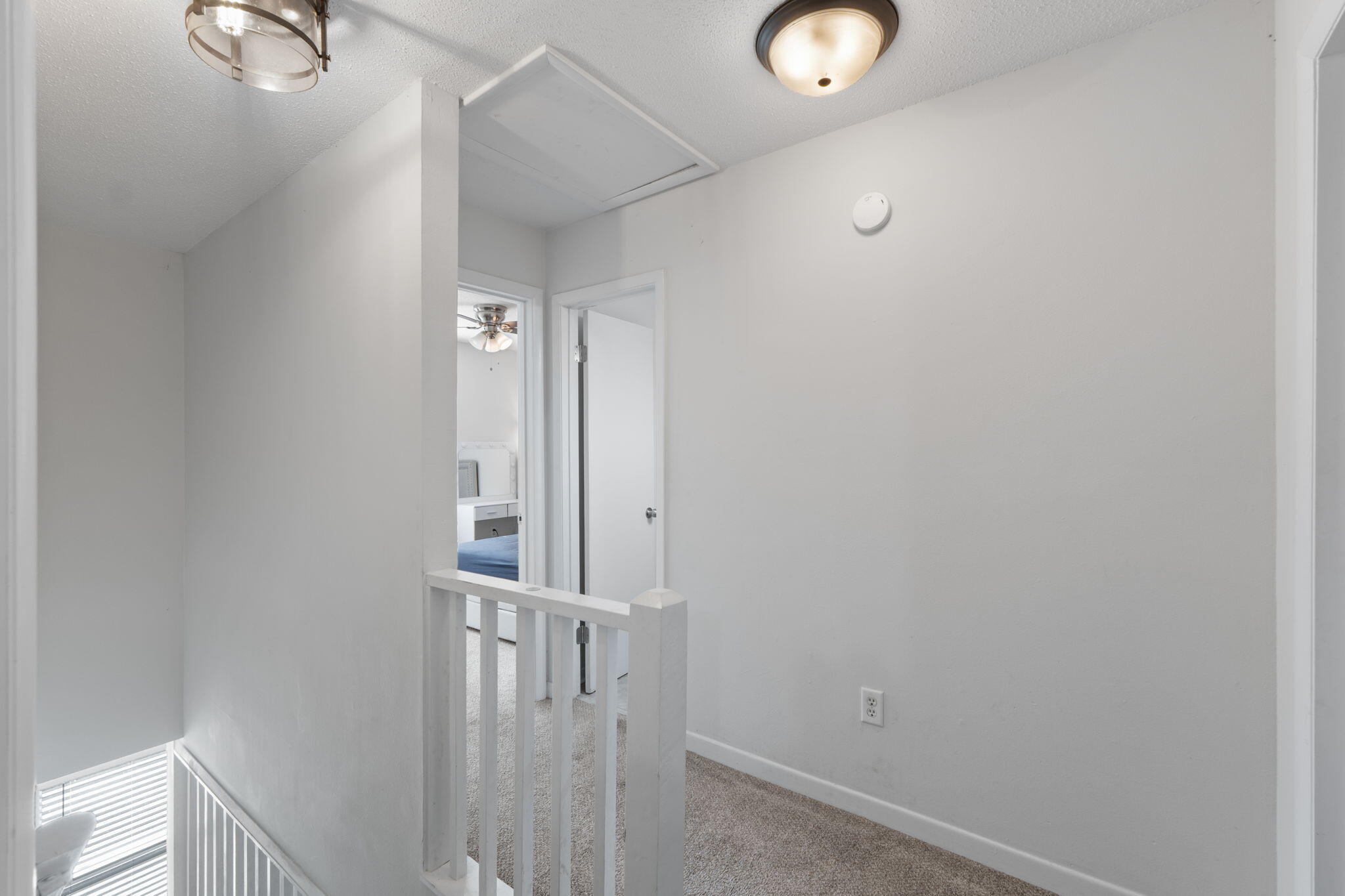 73 Kelly Way Valparaiso, FL 32580 - Photo 14 of 22 a view of a livingroom with wooden floor and white walls