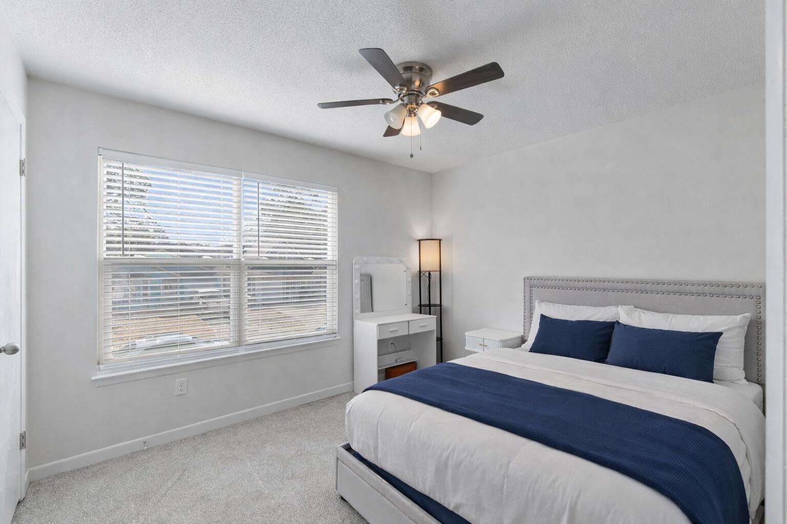 73 Kelly Way Valparaiso, FL 32580 - Photo 20 of 22 a bedroom with a large bed and a window