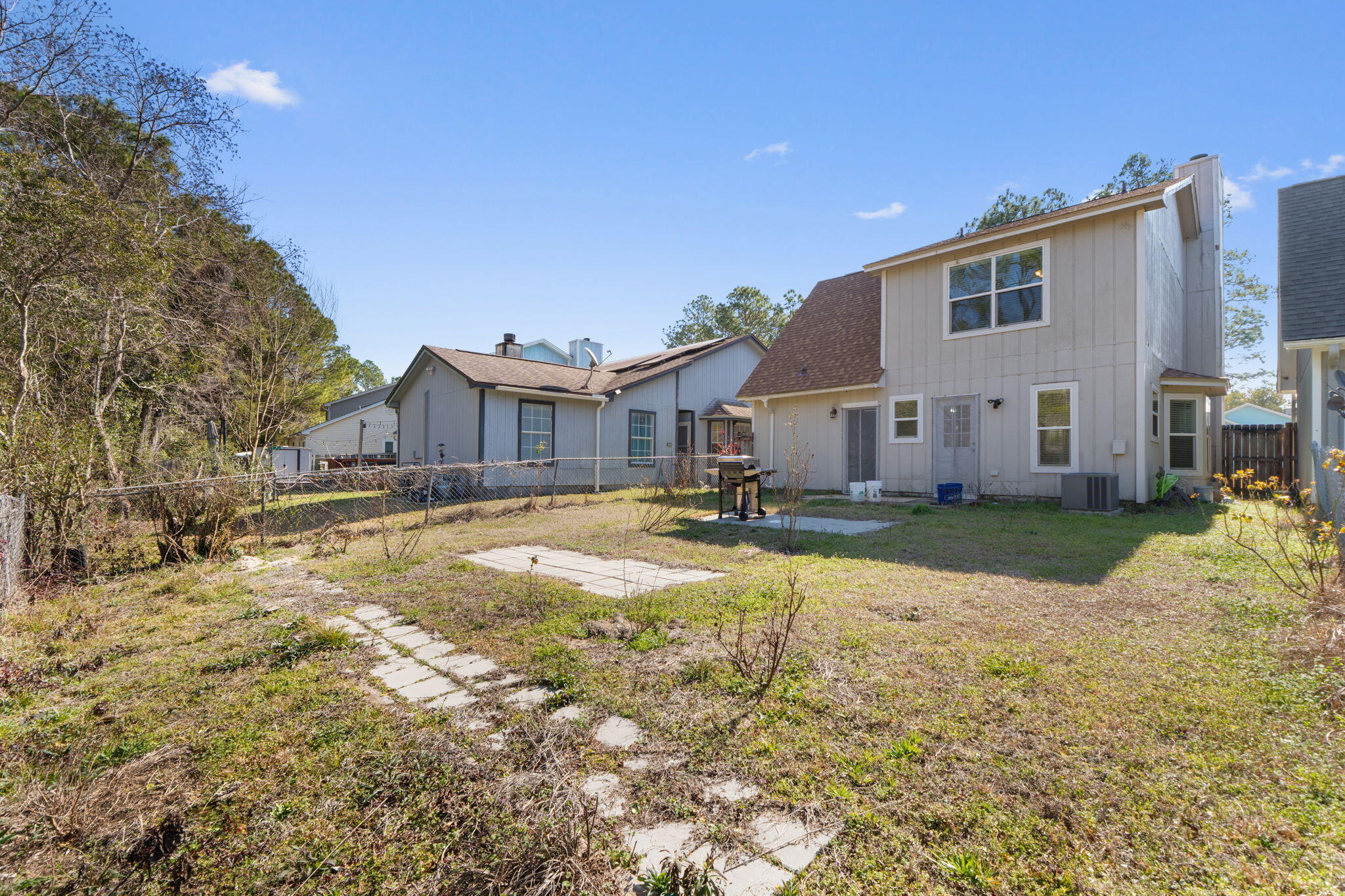 73 Kelly Way Valparaiso, FL 32580 - Photo 22 of 22 a view of a house with a yard