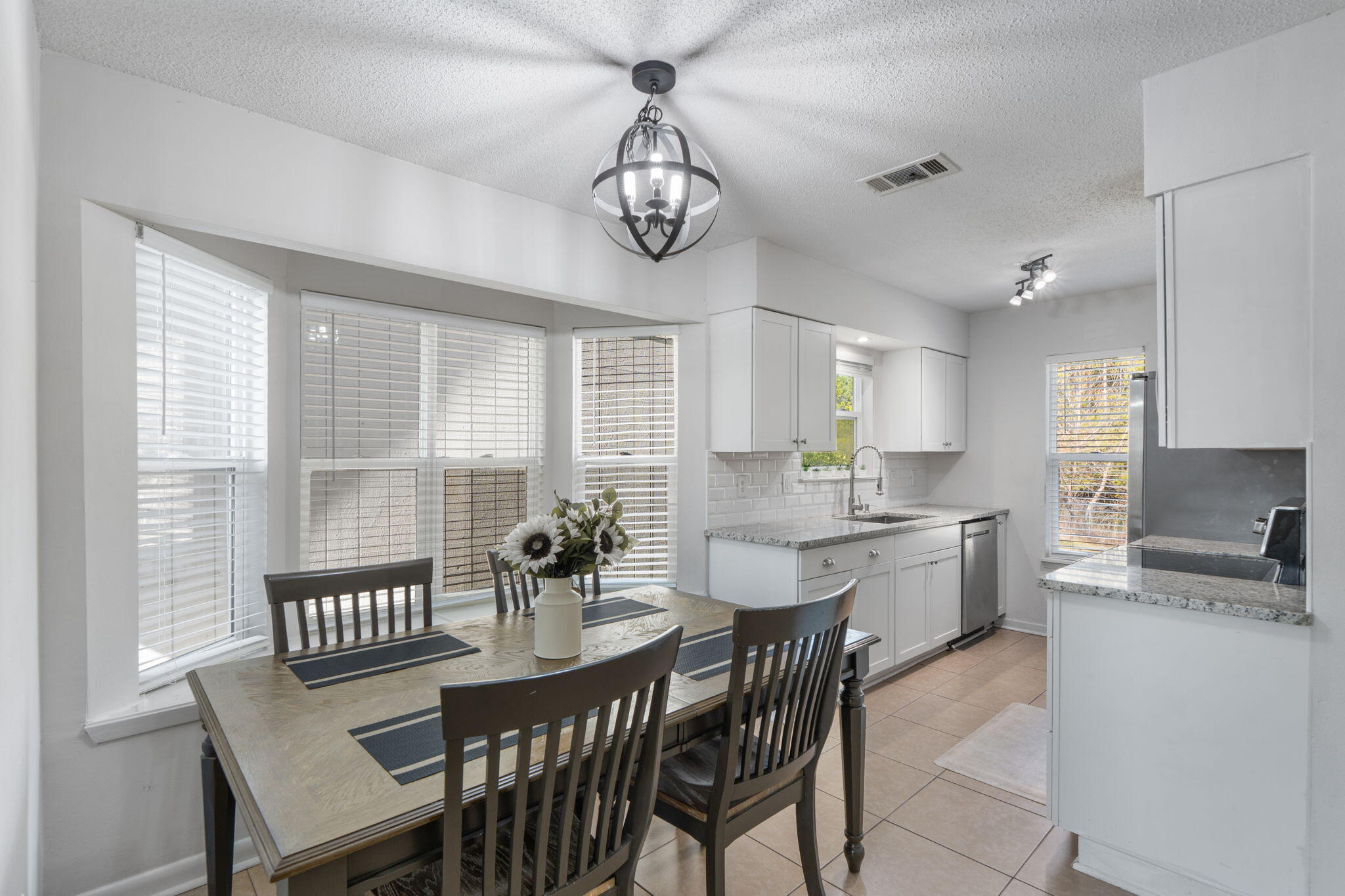 73 Kelly Way Valparaiso, FL 32580 - Photo 6 of 22 a view of a dining room with furniture window and wooden floor