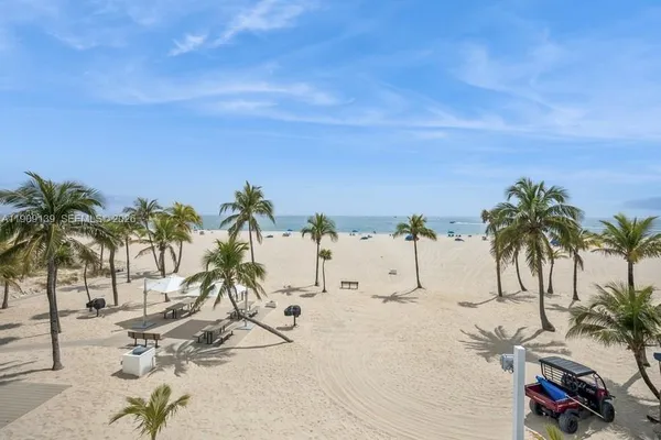 a view of outdoor space with palm trees