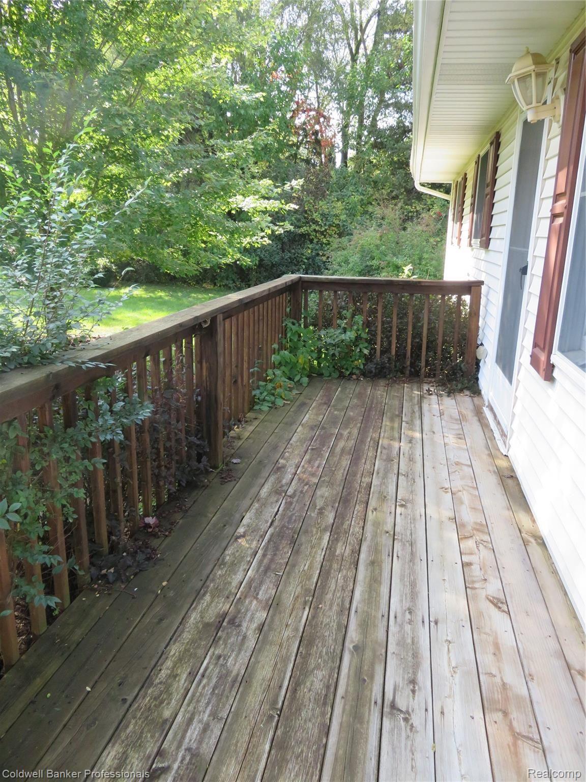 716 West Lansing Road Morrice, MI 48857 - Photo 13 of 17 13 716 porch.JPG