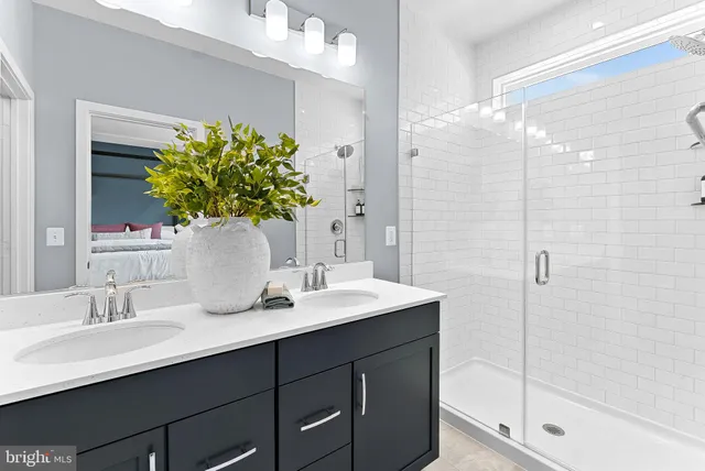 a bathroom with a sink a vanity and a mirror