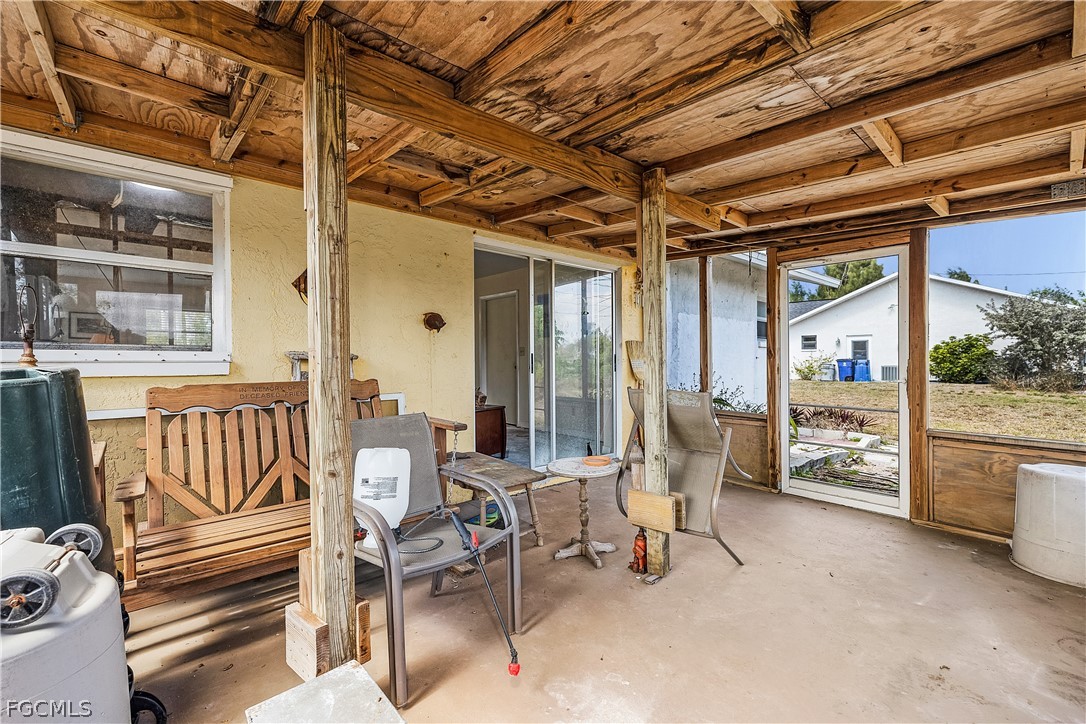 12170 Dolphin Road Bokeelia, FL 33922 - Photo 15 of 23 a view of an outdoor space with seating area