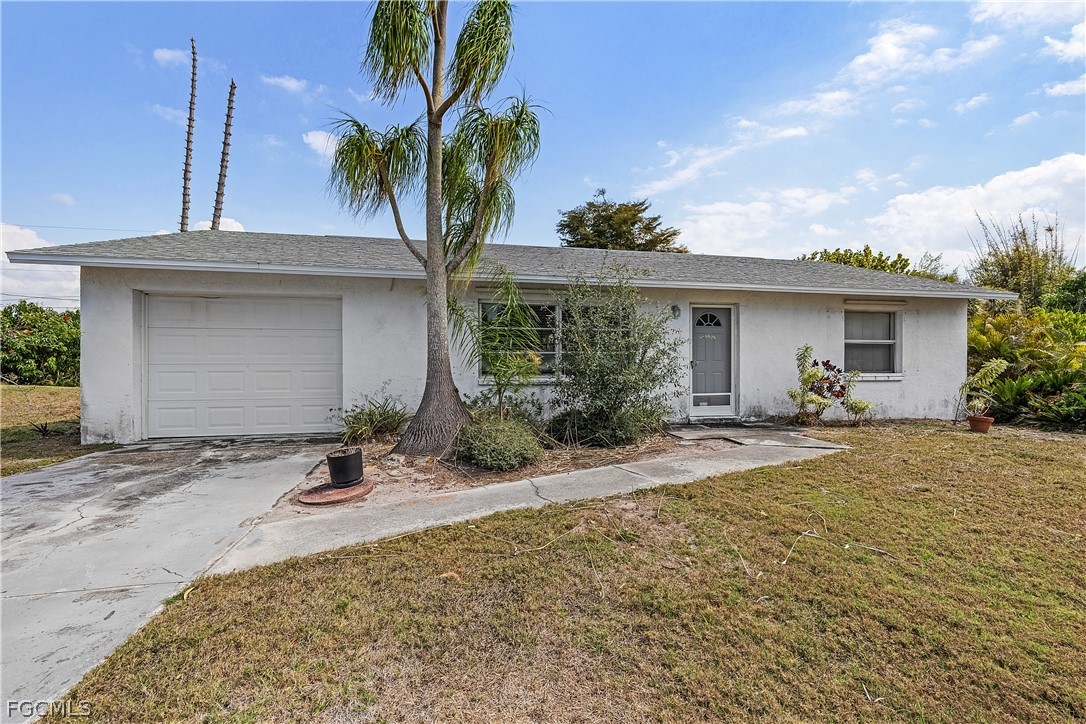 12170 Dolphin Road Bokeelia, FL 33922 - Photo 18 of 23 a view of a house with a patio