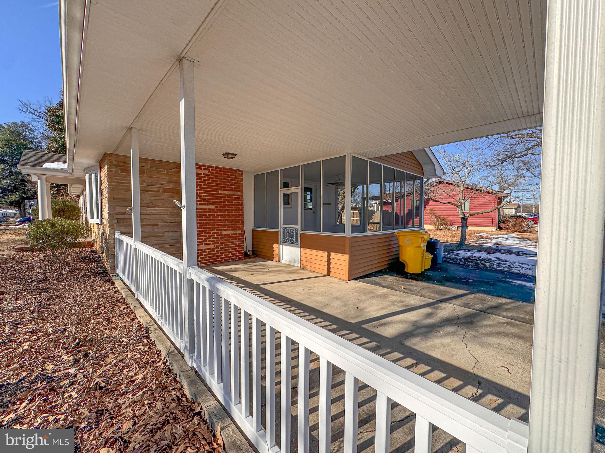 38 Redwood Road Severna Park, MD 21146 - Photo 5 of 41 Carport leads to screened porch; freshly painted