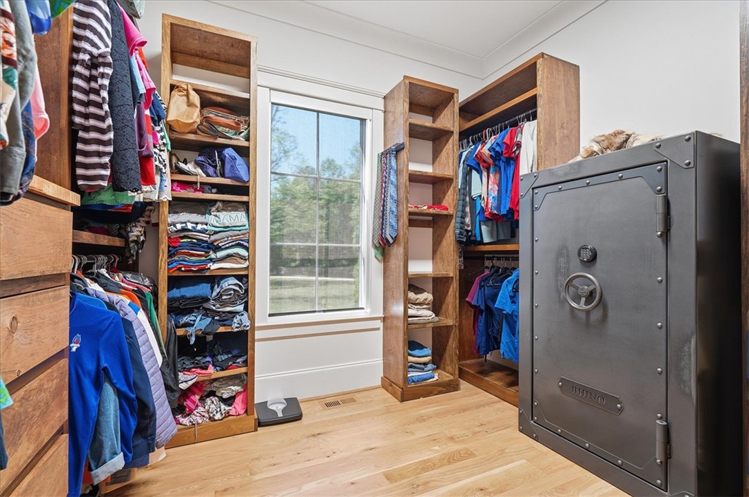 724 Red Hill Road Pickens, SC 29671 - Photo 16 of 50 Primary bedroom closet with custom shelving