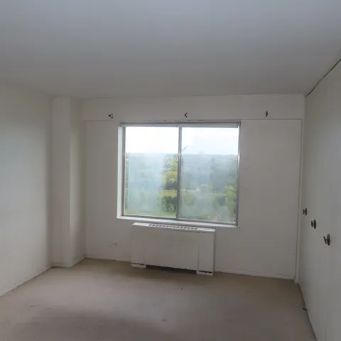 a view of a room with an empty space