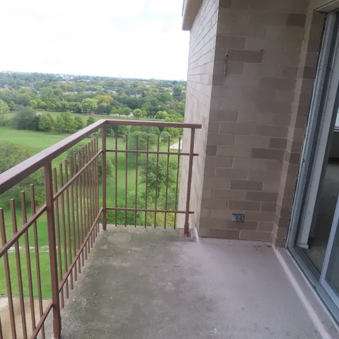 a view of building with yard