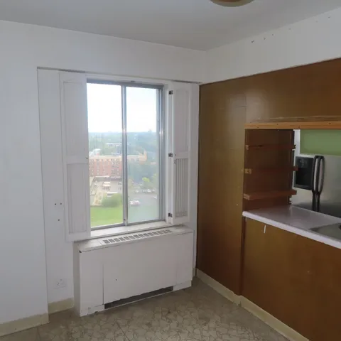 an empty room with windows