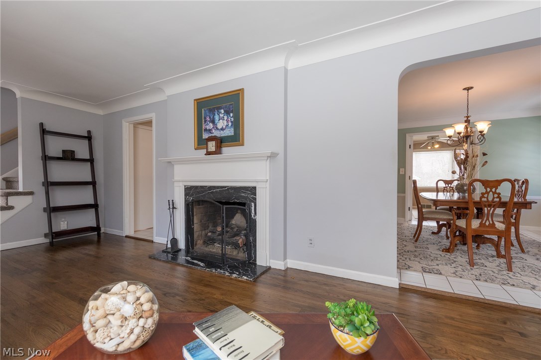 2432 Saybrook Road Cleveland, OH 44118 - Photo 5 of 32 The Living Room with a graceful archway to the dining room and a gentle coved ceiling