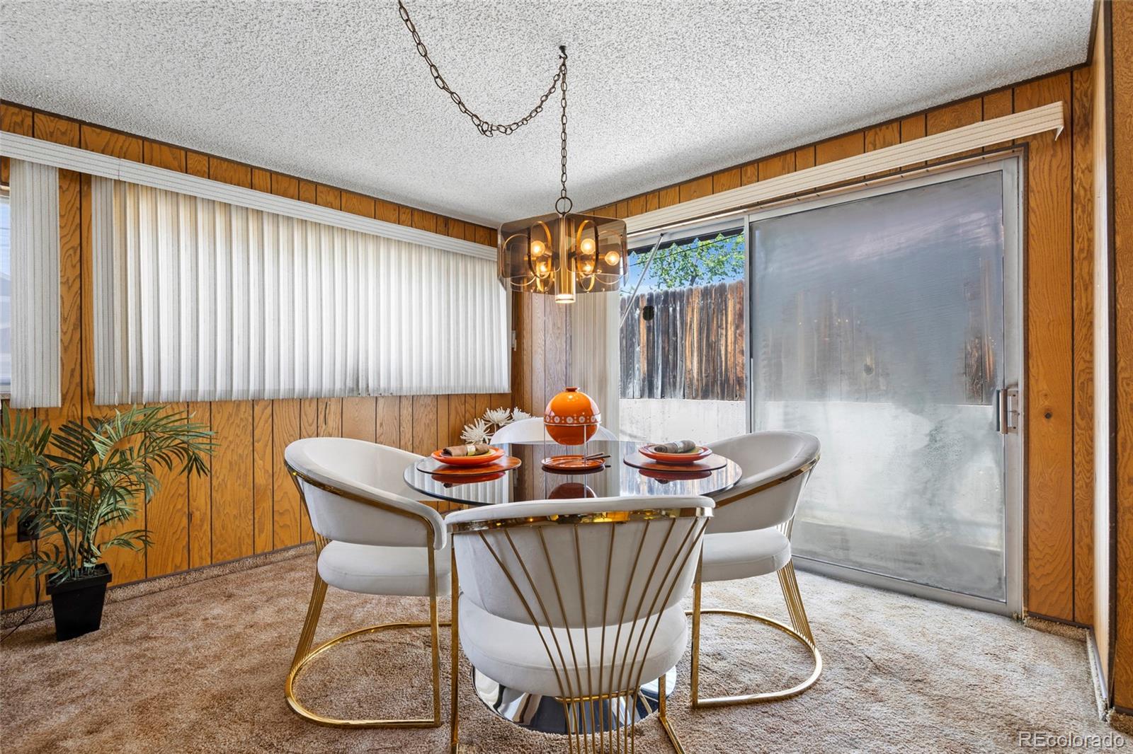 385 South Kearney Street Denver, CO 80224 - Photo 14 of 43 a table and chairs in a room
