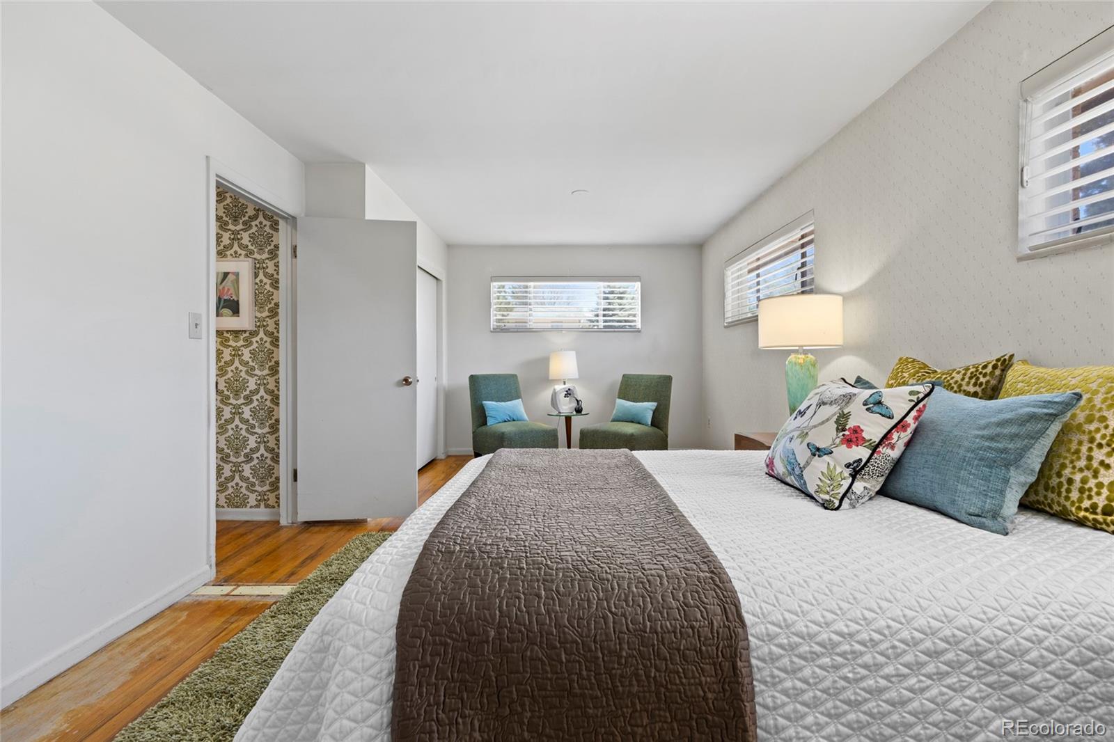 385 South Kearney Street Denver, CO 80224 - Photo 22 of 43 a bed room with a bed and a window