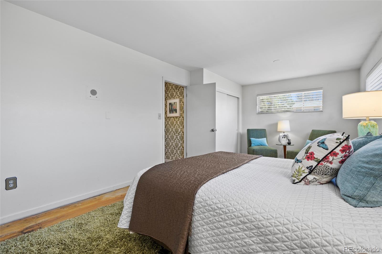 385 South Kearney Street Denver, CO 80224 - Photo 23 of 43 a bedroom with a bed and a window