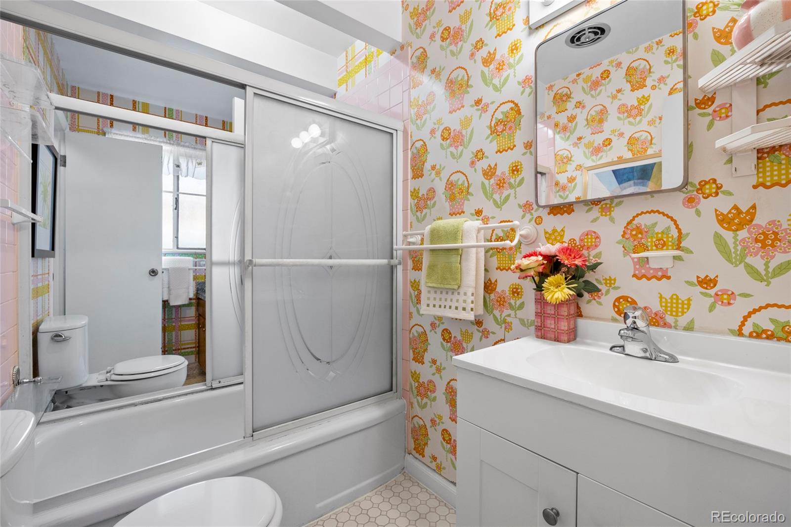 385 South Kearney Street Denver, CO 80224 - Photo 25 of 43 a bathroom with a sink toilet and shower