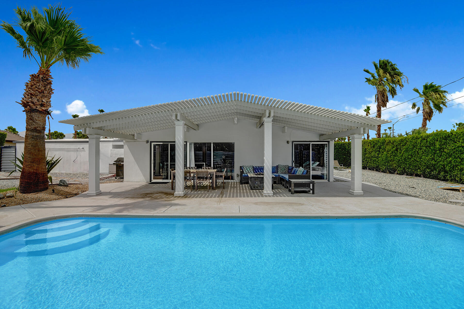 915 East Racquet Club Road Palm Springs, CA 92262 - Photo 4 of 36 BACK OF HOME HEAD ON.jpg mls