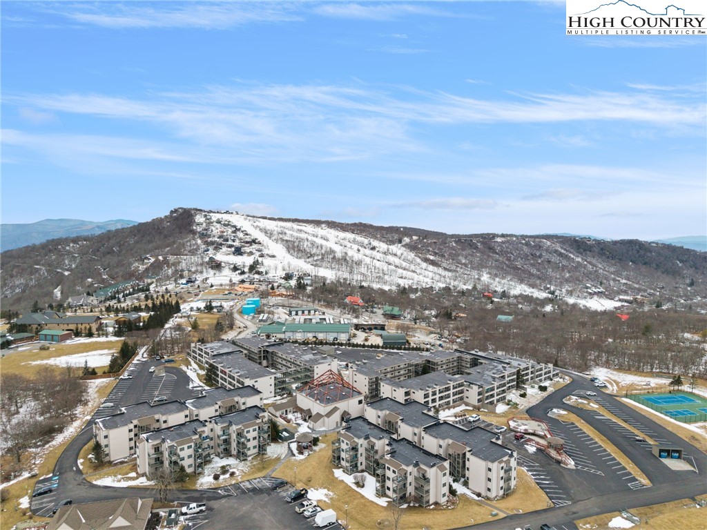 301 Pinnacle Inn Road, Unit 3219 Beech Mountain, NC 28604 - Photo 26 of 30 an aerial view of residential building and parking space