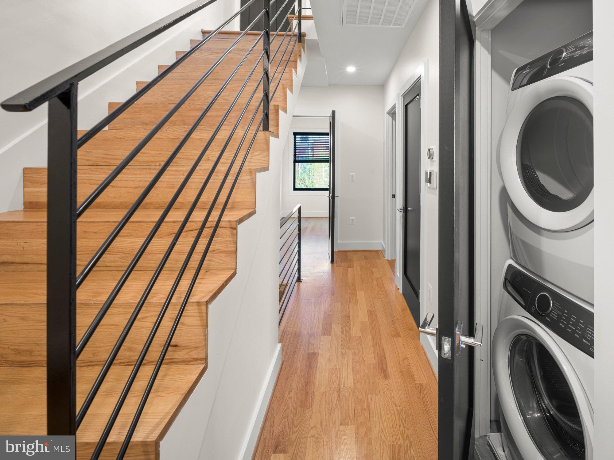 609 Gresham Place Northwest, Unit 2 Washington, DC 20001 - Photo 17 of 35 a view of a hallway with washer and dryer