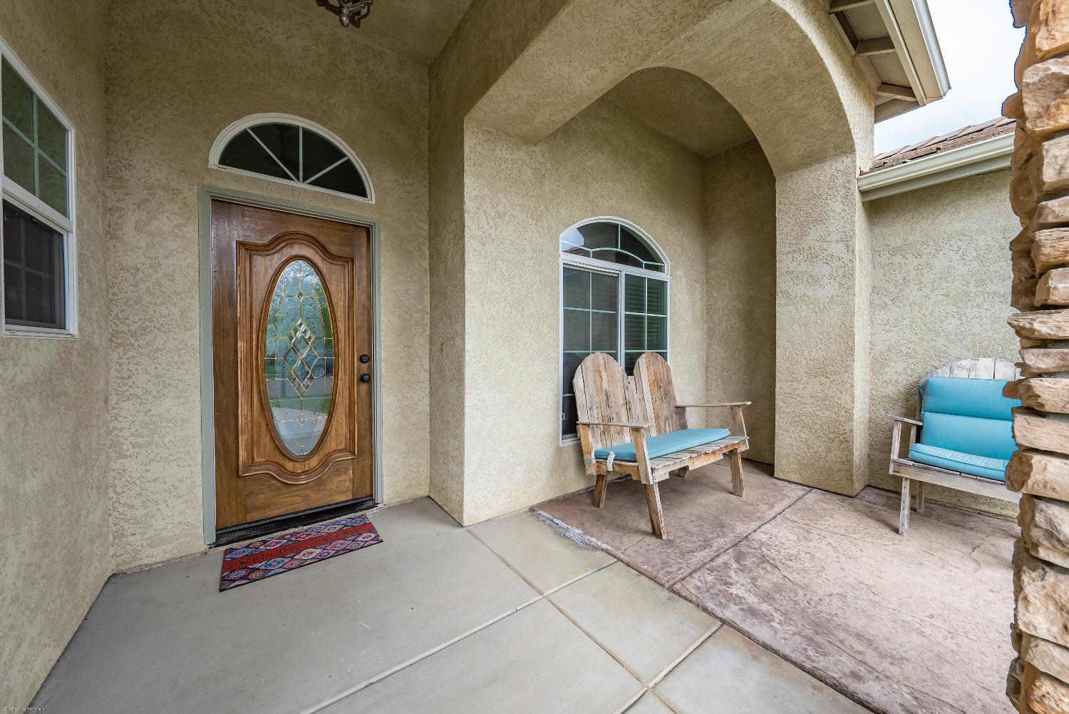 695 Crescent Lane Lemoore, CA 93245 - Photo 3 of 47 a living room with furniture and a floor to ceiling window