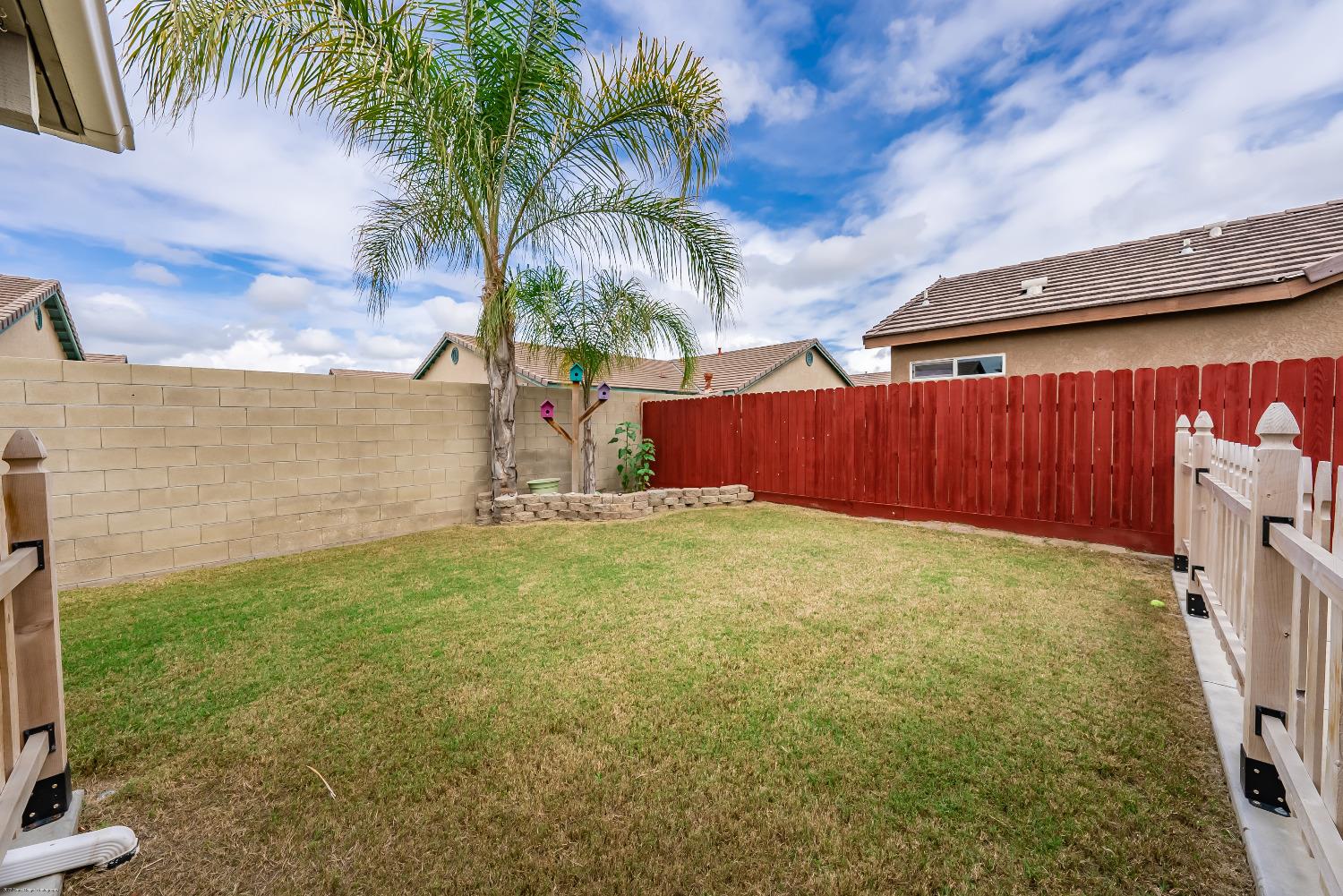 695 Crescent Lane Lemoore, CA 93245 - Photo 31 of 47 a view of a backyard
