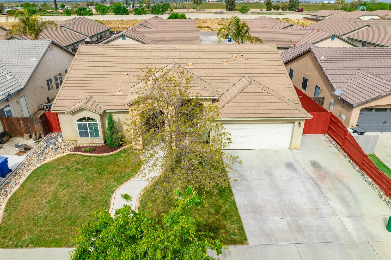695 Crescent Lane Lemoore, CA 93245 - Photo 40 of 47 an aerial view of a house