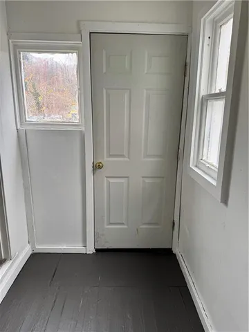 an empty room with windows