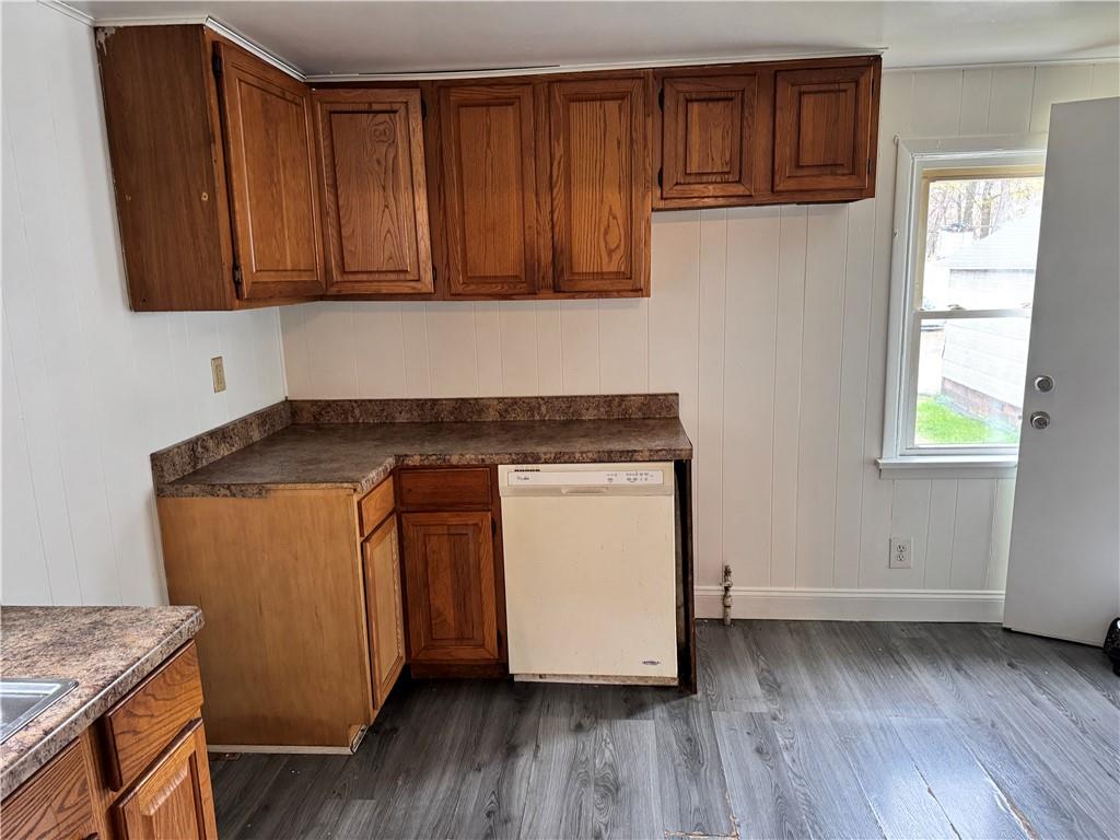133 Sherman Avenue Vandergrift, PA 15690 - Photo 16 of 16 a utility room with wooden floor washer and dryer