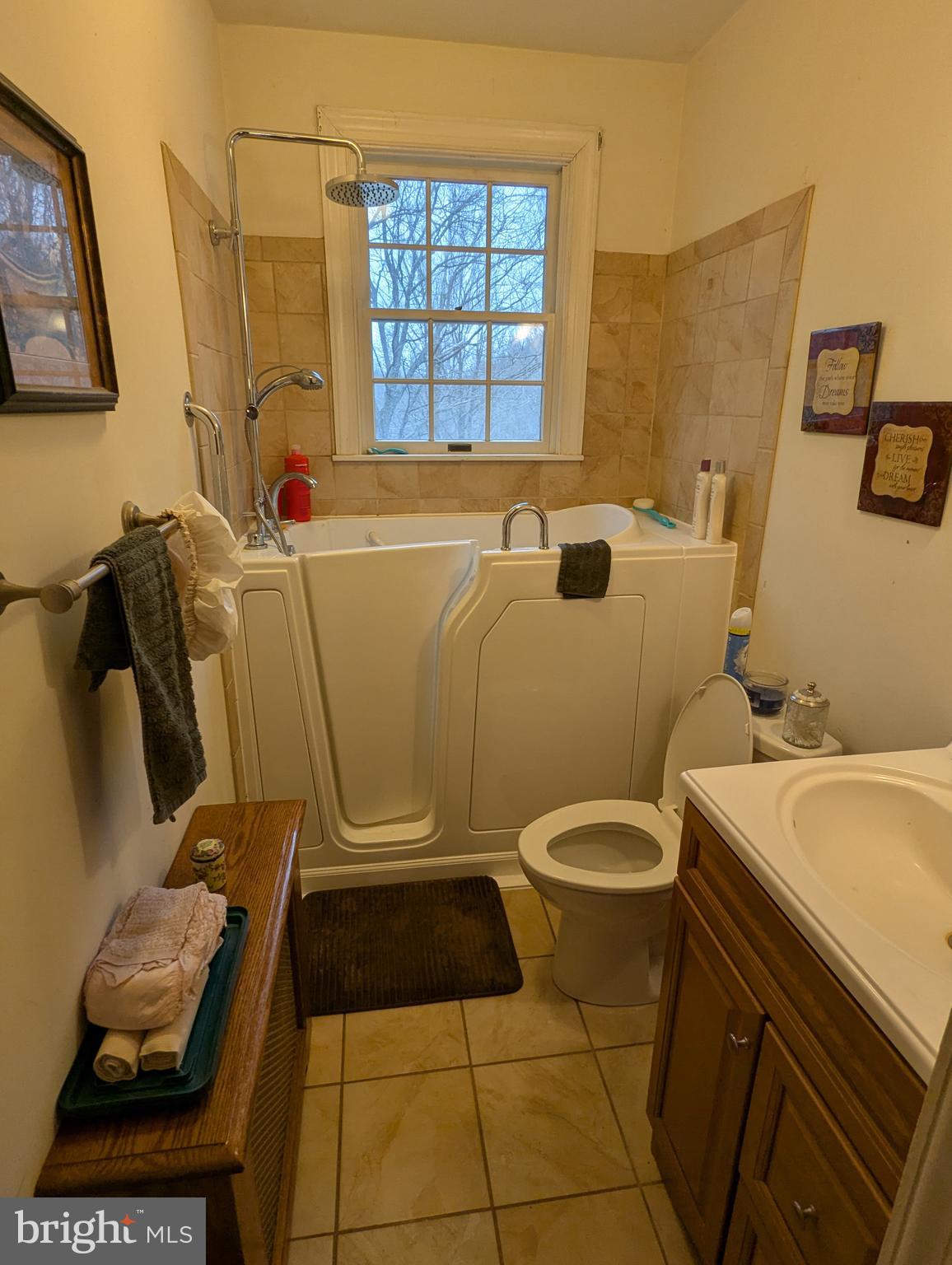 1475 Woodstock Road Woodstock, MD 21163 - Photo 18 of 26 a bathroom with a sink and bathtub