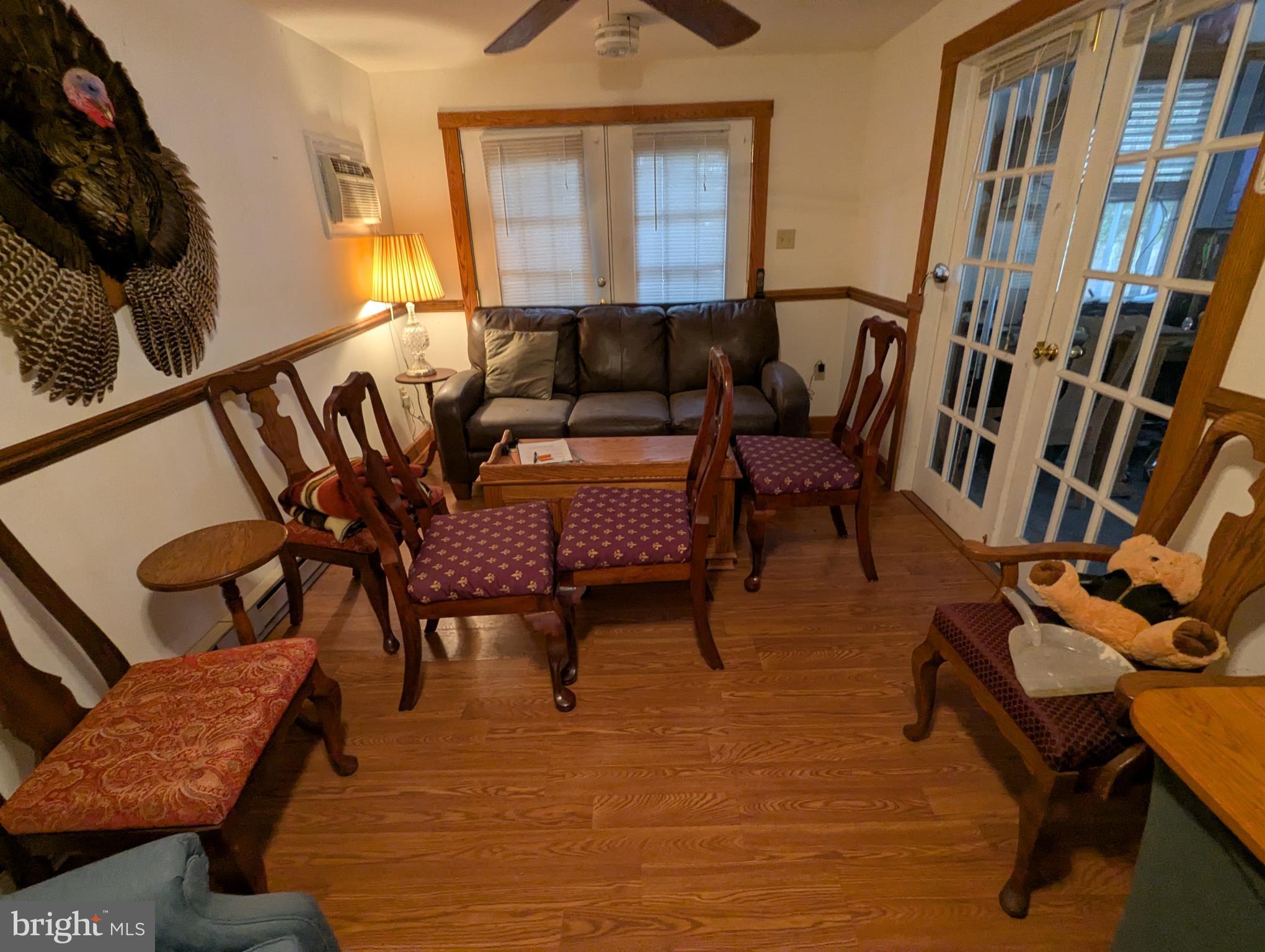 1475 Woodstock Road Woodstock, MD 21163 - Photo 24 of 26 a living room with furniture and a window