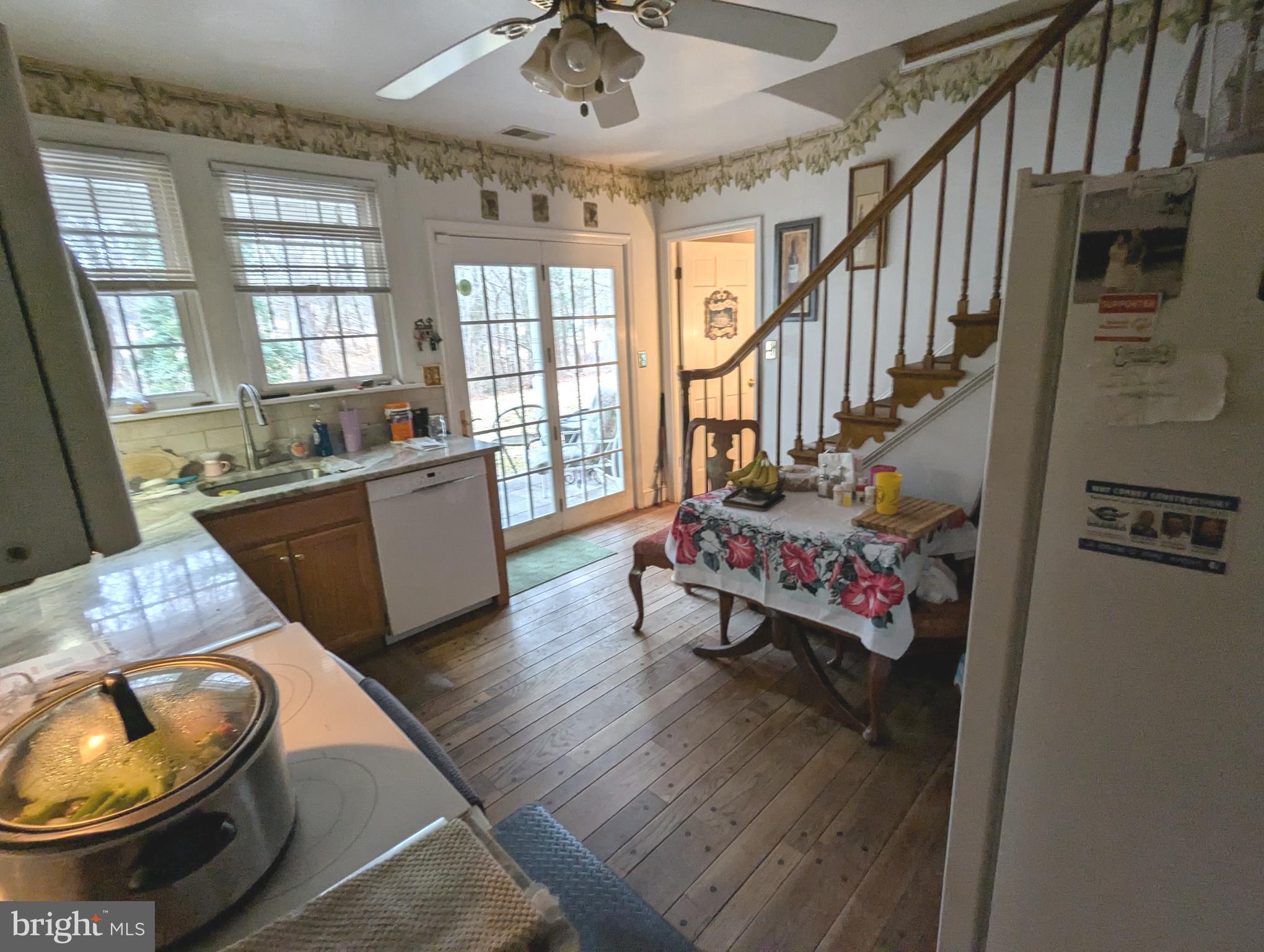 1475 Woodstock Road Woodstock, MD 21163 - Photo 4 of 26 a living room with furniture and a wooden floor