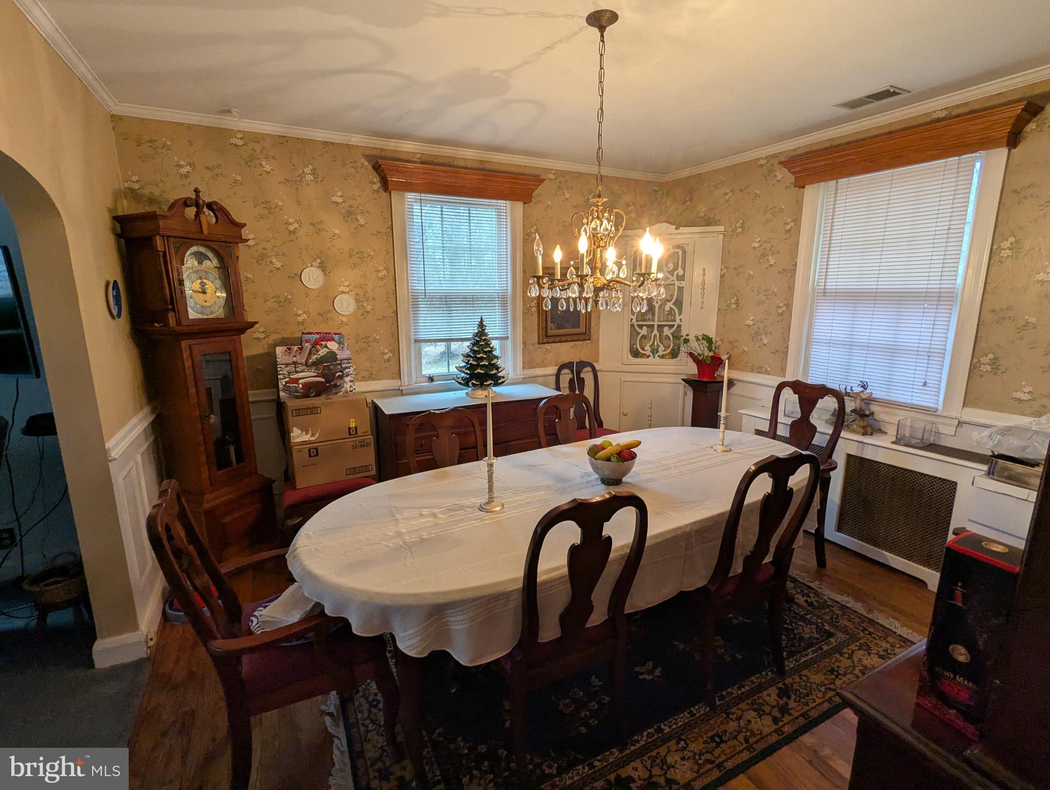 1475 Woodstock Road Woodstock, MD 21163 - Photo 6 of 26 a view of a dining room with furniture window and wooden floor