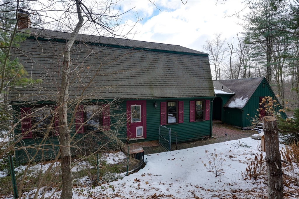 15 Rocky Pond Road Boylston, MA 01505 - Photo 2 of 39 a front view of a house with garden