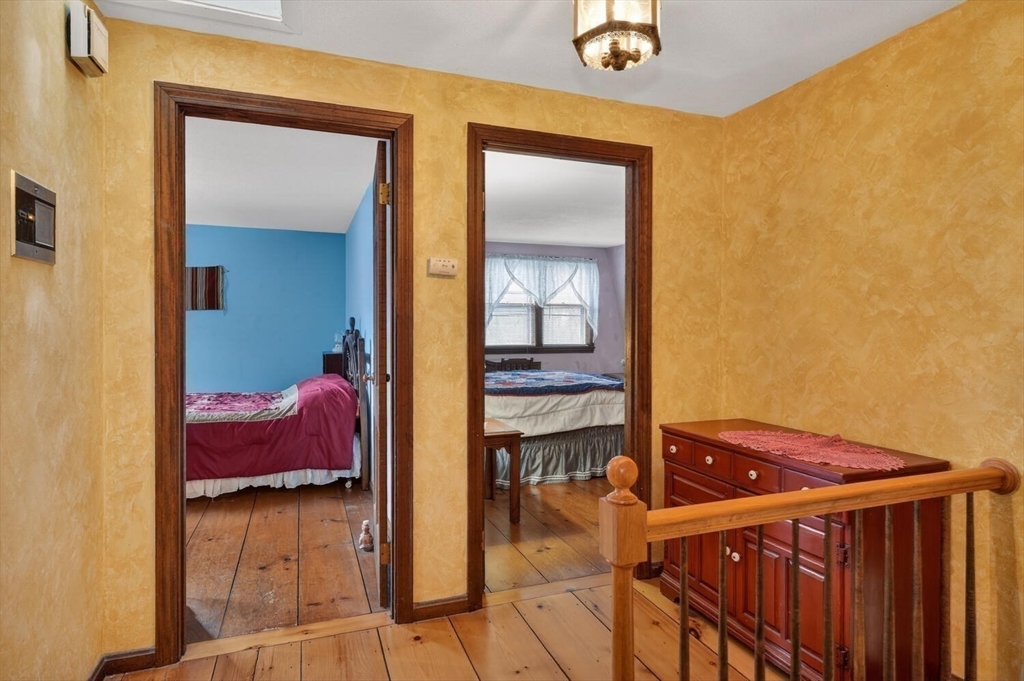 15 Rocky Pond Road Boylston, MA 01505 - Photo 27 of 39 a view of hallway with livingroom and furniture
