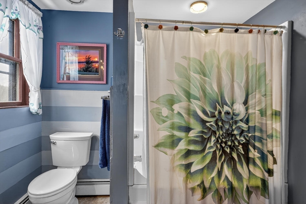 15 Rocky Pond Road Boylston, MA 01505 - Photo 31 of 39 a bathroom with a toilet and a sink