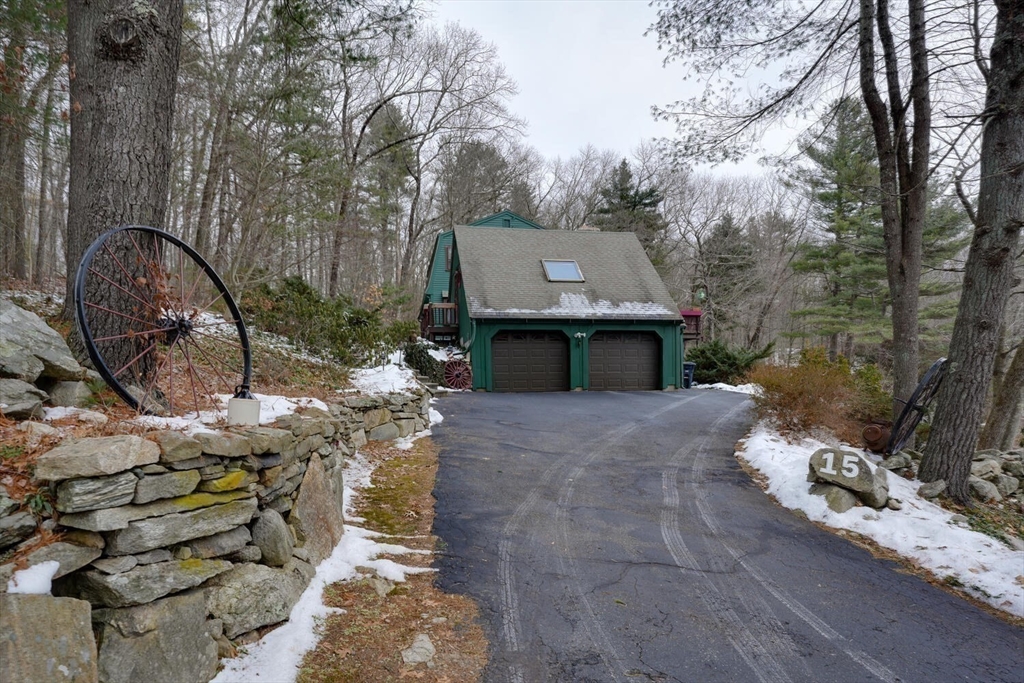 15 Rocky Pond Road Boylston, MA 01505 - Photo 34 of 39 a view of a backyard with iron fence