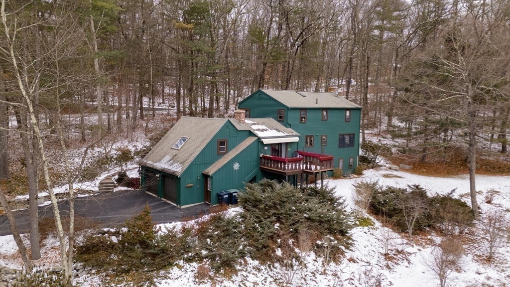 15 Rocky Pond Road Boylston, MA 01505 - Photo 36 of 39 a view of a chairs and table in the patio
