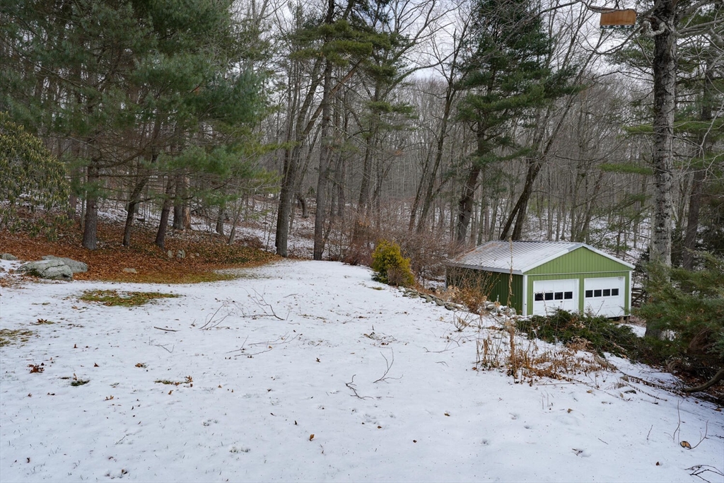 15 Rocky Pond Road Boylston, MA 01505 - Photo 5 of 39 a view of a backyard of the house