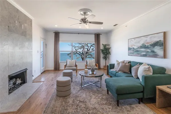 a view of a terrace with hardwood floor and lake view