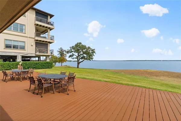 a view of a terrace with wooden floor and outdoor space