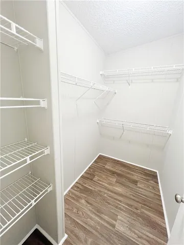 a view of a room with racks on the wall