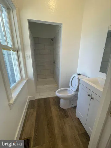 a view of gallery with wooden floor