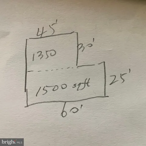 a view of an empty room with a fireplace