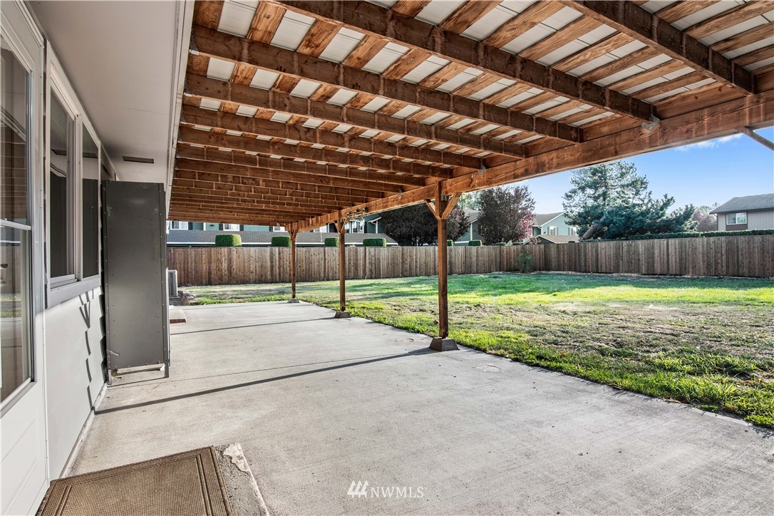 7404 Golden Given Road East Tacoma, WA 98404 - Photo 20 of 23 a view of a backyard with fence