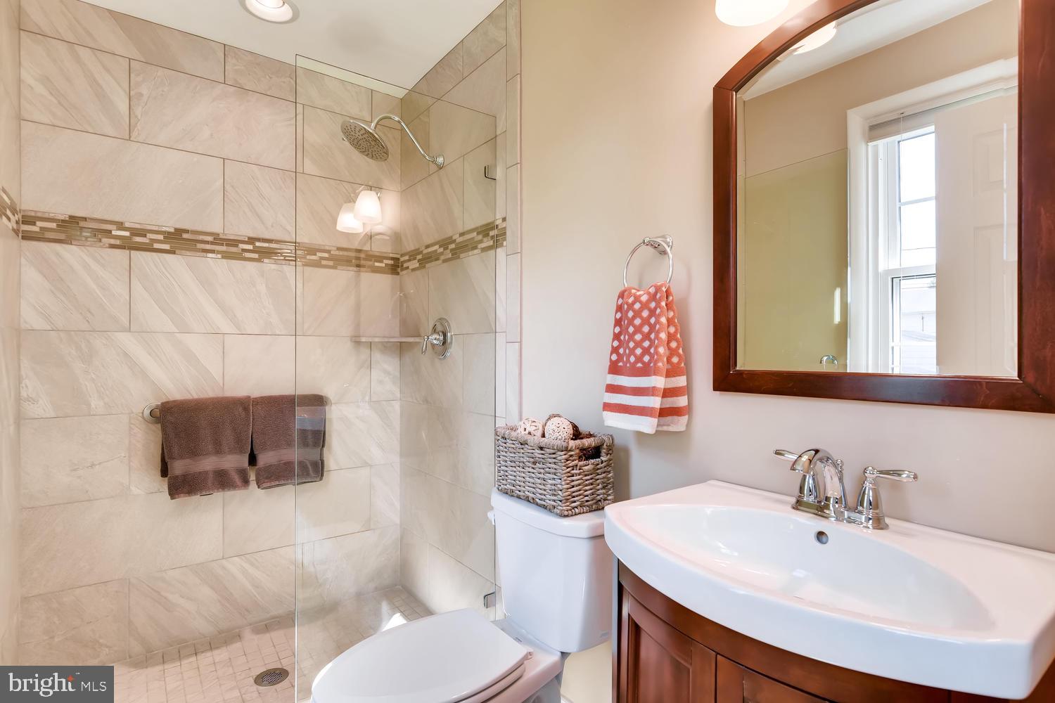 8118 Thornton Road Baltimore, MD 21204 - Photo 12 of 33 Tile shower surround & Floor in Updated Masterbath