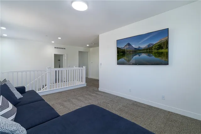 a view of a backyard with sitting area