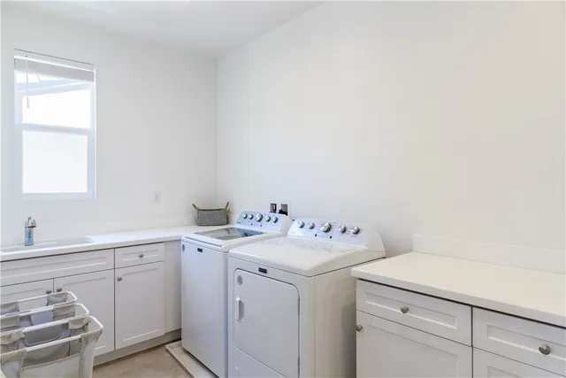 an aerial view of multiple houses with yard