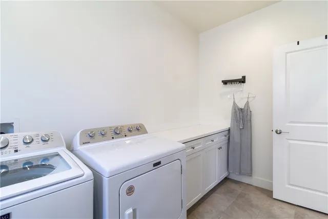an aerial view of a houses with outdoor space