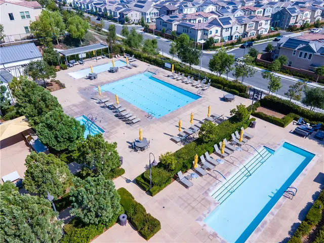 a view of a swimming pool from a balcony